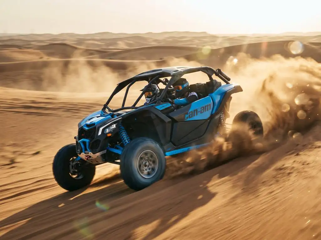 Blue Can-Am Maverick X3 2-seat dune buggy racing across Dubai sand