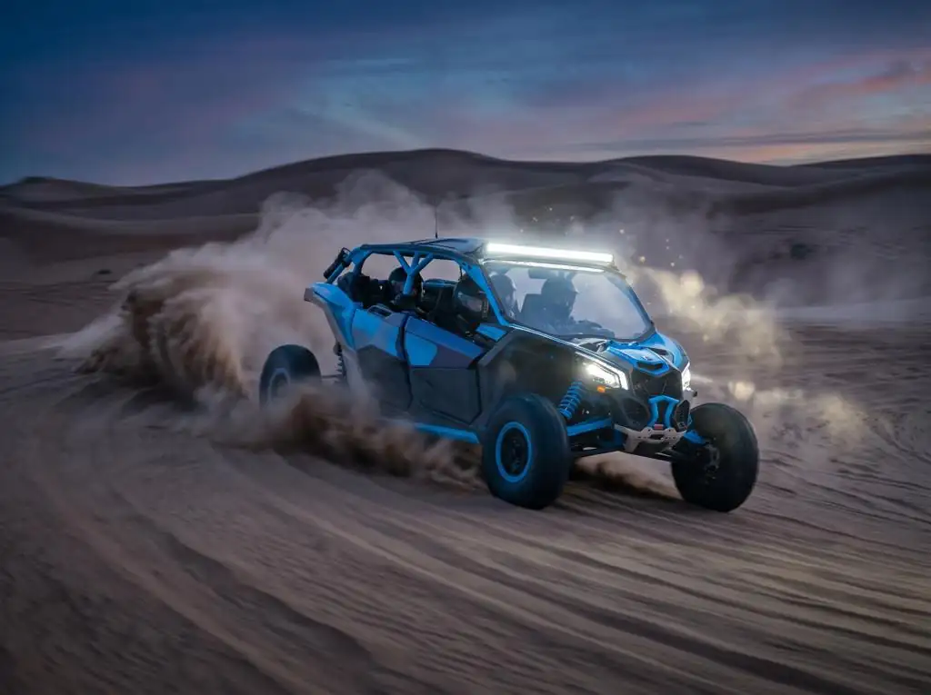 Can-Am Maverick X3 MAX 4-seat dune buggy with LED light bar at dusk in Dubai